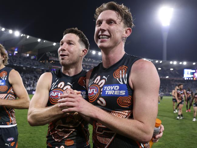 GEELONG, AUSTRALIA - MAY 25: Toby Greene of the Giants celebrates with Lachie Whitfield of the Giants after their win during the 2024 round 11 AFL match between Geelong Cats and Greater Western Sydney Giants at GMHBA Stadium, on May 25, 2024, in Geelong, Australia. (Photo by Martin Keep/AFL Photos/Getty Images)