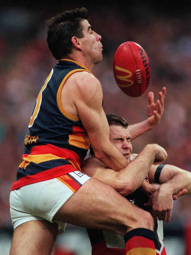 Adelaide’s Darren Jarman marks over St Kilda’s Steven Sziller in the 1997 Grand Final.