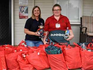 Irene Tanks and Tileah Pannach are determined to help families at Christmas. Picture: Ebony Graveur