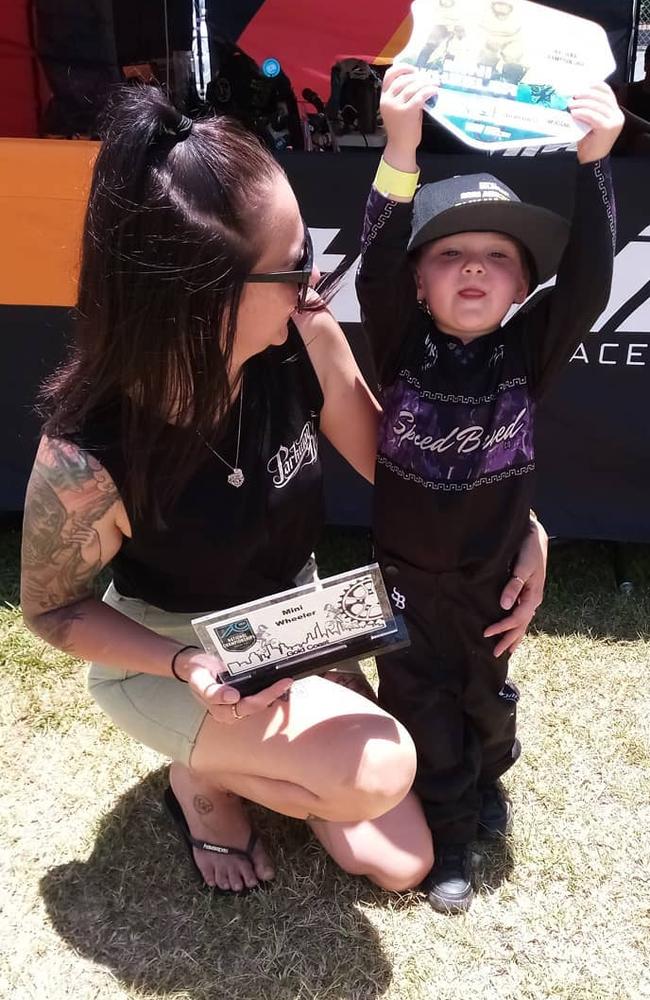 Mum and her little champion with yet another trophy.