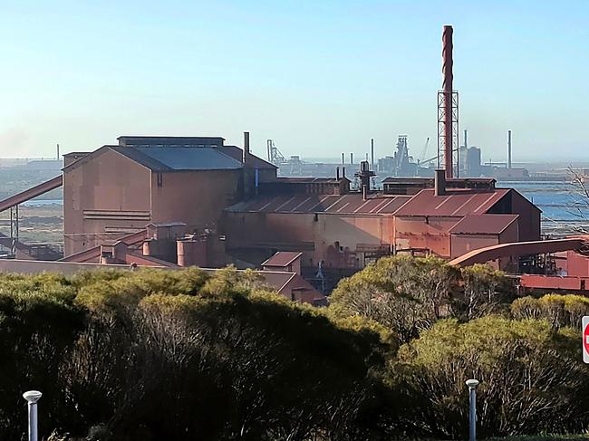 This handout photo taken by Nicholas Williams-Chamarro on August 26, 2023 shows the Whyalla steelworks in Whyalla, South Australia. The failing Australian major steel plant at Whyalla, owned by British billionaire Sanjeev Gupta's company GFG Alliance, will be transformed into a hub for making "green iron and steel", Prime Minister Anthony Albanese said Thursday as the government stepped in with a billion-dollar rescue package. (Photo by Nicholas Williams-Chamarro / AFP) / RESTRICTED TO EDITORIAL USE - MANDATORY CREDIT "AFP PHOTO / NICHOLAS WILLIAMS-CHAMARRO" - NO MARKETING NO ADVERTISING CAMPAIGNS - DISTRIBUTED AS A SERVICE TO CLIENTS