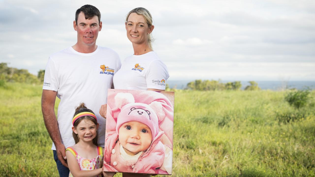 Todd and Tammy Patch, with daughter Madison, hold a photo of daughter Sophie Grace. They are holding an Australia Day goldfish race and auction raising funds for the Children's Hospital Foundation in Sophie's memory, Tuesday, January 23, 2024. Picture: Kevin Farmer