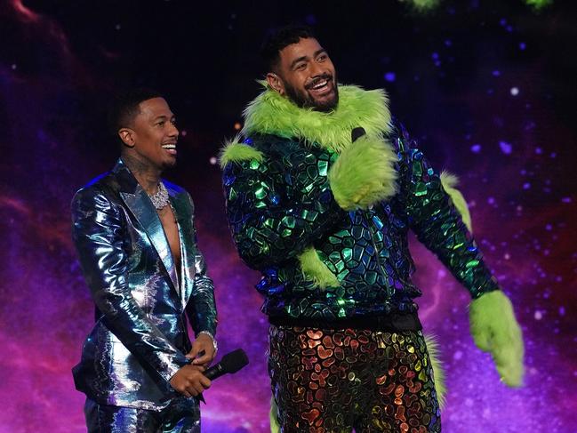 Host Nick Cannon and Jordan Mailata in The Masked Singer. (Photo by FOX via Getty Images)