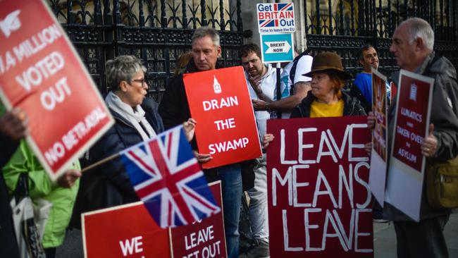 Demonstrators outside the Houses of Parliament.