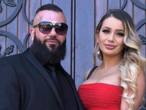 SUNDAY TELEGRAPH SPECIAL.SNITCH.Kayla Tianne Attie, 22, has been charged for using fake cash on a $2000 shopping spree through Eastgardens Westfield on October 1, 2019. She is pictured here with her boyfriend, alleged Finks bikie gang member  Sarmad Mekhail