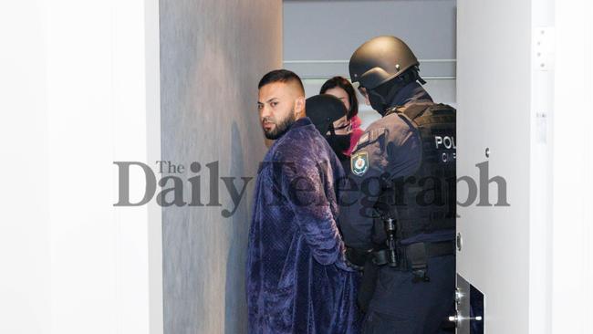 Police officers from Strike Force Odin arrest Mohamad Alameddine at his apartment in Pyrmont in November 2023. Picture: Max Mason-Hubers