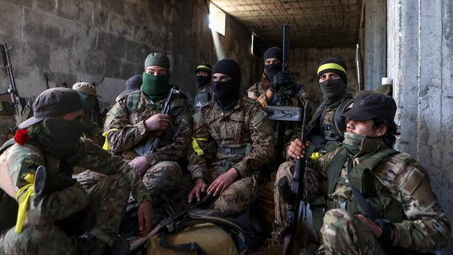 Fighters deploy in Atareb in the western areas of Syria's northern Aleppo province, on November 28. Picture: Aaref Watad/AFP