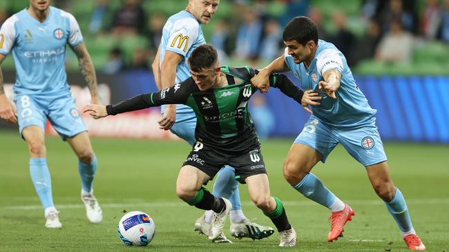 Western United’s Dylan Wenzel-Halls is challenged by Melbourne City’s Nuno Reis in a December derby. Picture: Robert Cianflone/Getty Images