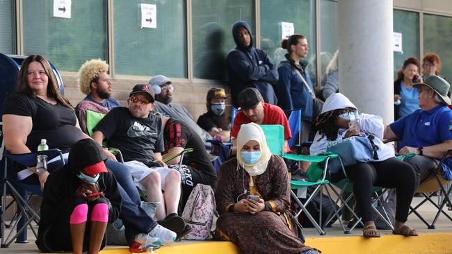 Unemployed Kentucky residents wait in line outside the Kentucky Career Center for help with their unemployment claims in Frankfort, Kentucky. Picture: AFP