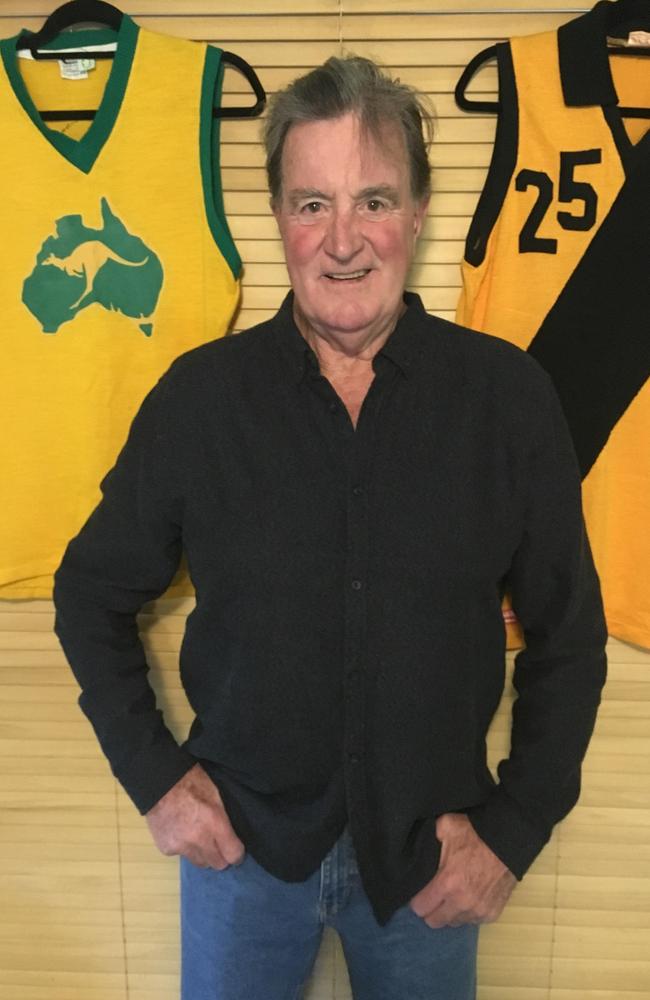 Ron Stubbs with his All Australian jumper and the WA strip worn by Graham Moss.