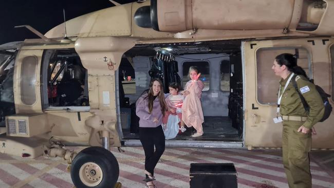 Israelis held captive by Hamas arrive in Israel aboard an army helicopter, following their release on November 24, 2023 by the militant Palestinian group in Gaza. Picture: AFP PHOTO / ISRAELI ARMY