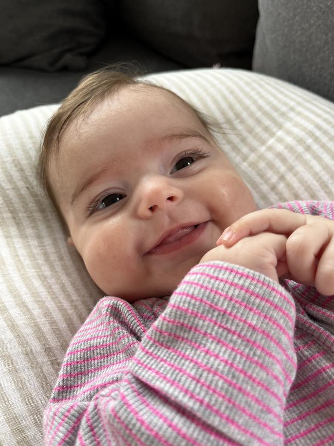 Evie Spicer. Four months. Evie is the happiest little baby. Always smiling and so cHill. She has an older brother Archie (19 months) who keeps her entertained 24/7.
