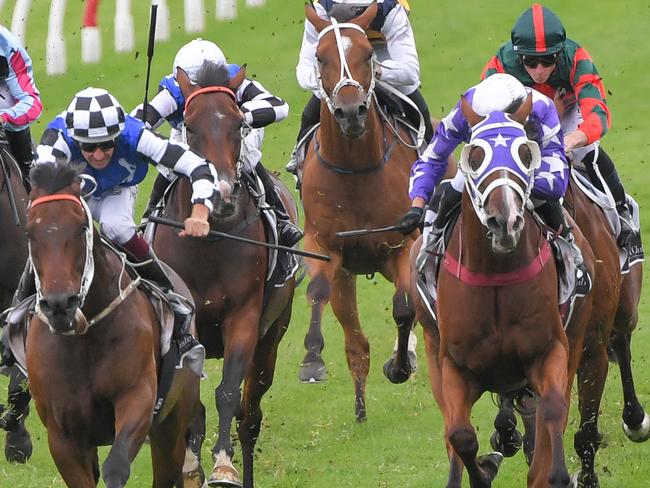 Hugh Bowman puts away the whip after riding Mustajeer to victory on Silver Slipper Stakes Day at Rosehill Gardens last month.