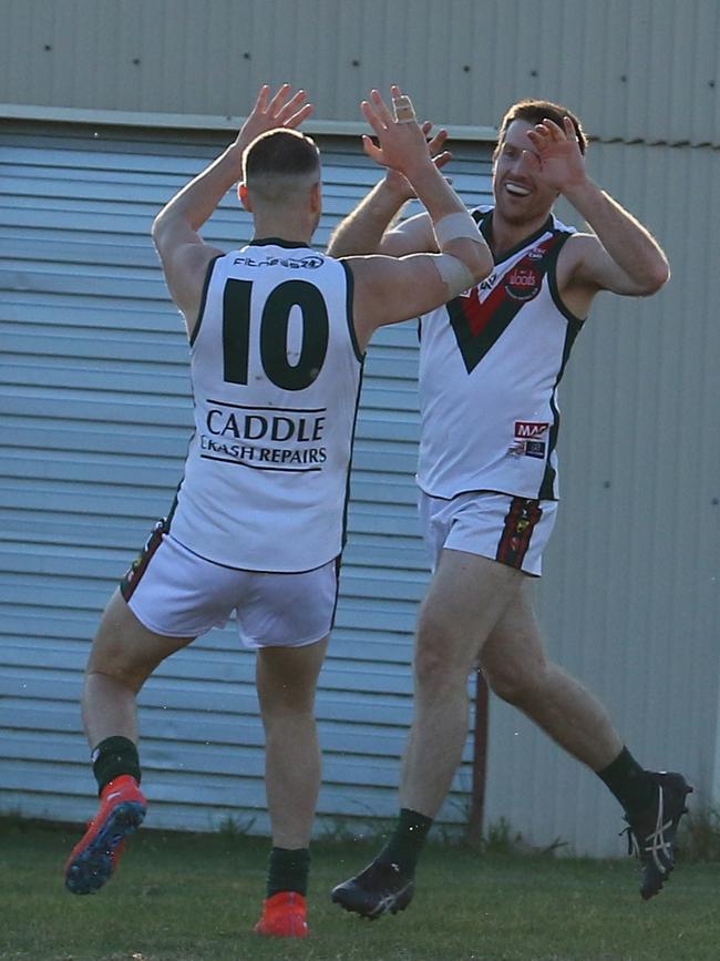 Blackwood players Joel Aish and Ryan Dijksman celebrate a goal against Uraidla. Picture: Fi Zevenboom