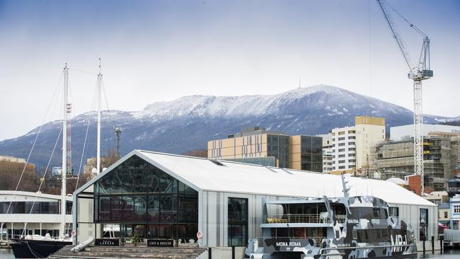 Mt Wellington / kunyani with snow on it, with Brook St Pier in the forground. Picture: Richard Jupe