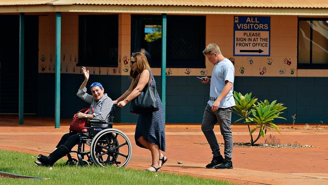 Family and friends arrive at Casuarina Street primary school for Dolly Everett's memorial service in Katherine, Northern Territory.