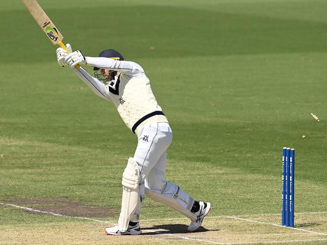 MELBOURNE, AUSTRALIA - FEBRUARY 21: Glenn Maxwell of Victoria is bowled by Wes Agar of South Australia during the Sheffield Shield match between Victoria and South Australia at CitiPower Centre, on February 21, 2023, in Melbourne, Australia. (Photo by Quinn Rooney/Getty Images)