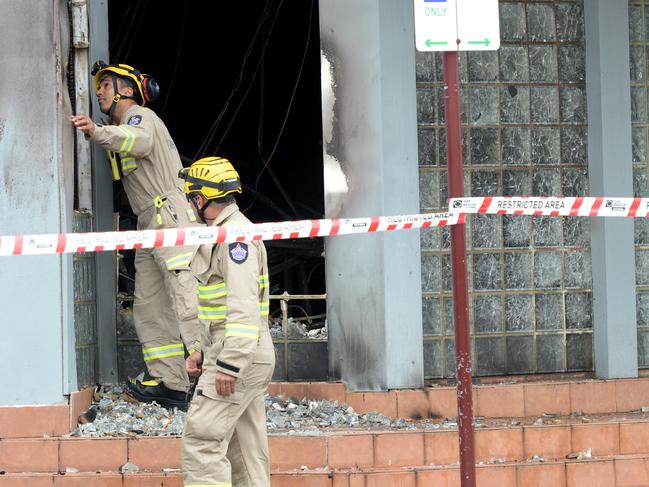 Police and fire crews mop up after the fire at the synagogue in East St Kilda, Victoria. Picture: Andrew Henshaw