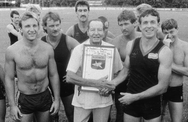 Don Bonson with Essendon's captain Terry Daniher and his beloved Bombers in Darwin.