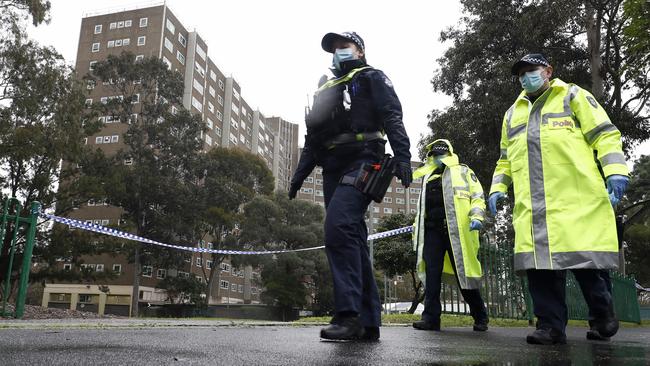 Police patrol public housing towers in North Melbourne. Picture: Getty