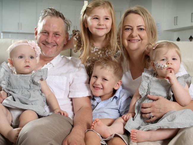 Tube feeding awareness week - Susan and Ben Dzioba of Mawson Lakes, have two sets of twins under age 5. Leo and Myla,4, are fine, but the youngest twins, Avaya (R), and Maisie,1, require tube feeding due to a rare condition. 10 February 2024. Picture Dean Martin