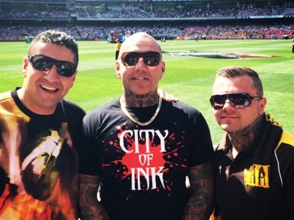 Kazem Hamad (left) at the footy with Toby Mitchell and senior Mongol bikie Tyrone Bell.  Picture: Instagram