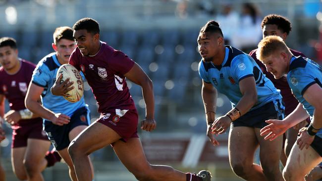 QLD's Gabriel Satrick makes a break during the under 18 ASSRL schoolboy rugby league championship grand final between QLD v NSW CHS in 2022.Picture: Zak Simmonds