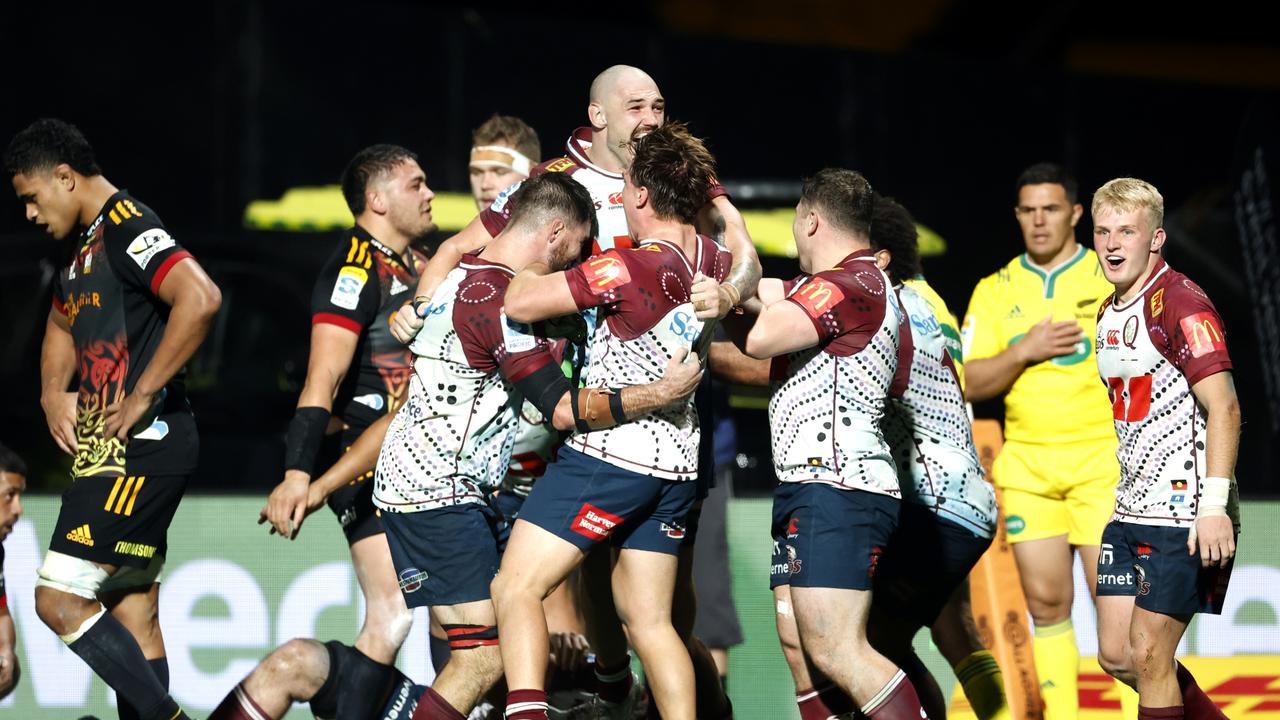 NEW PLYMOUTH, NEW ZEALAND - MAY 12: The Reds celebrate after winning the round 12 Super Rugby Pacific match between Chiefs and Queensland Reds at Yarrow Stadium, on May 12, 2023, in New Plymouth, New Zealand. (Photo by Andy Jackson/Getty Images)