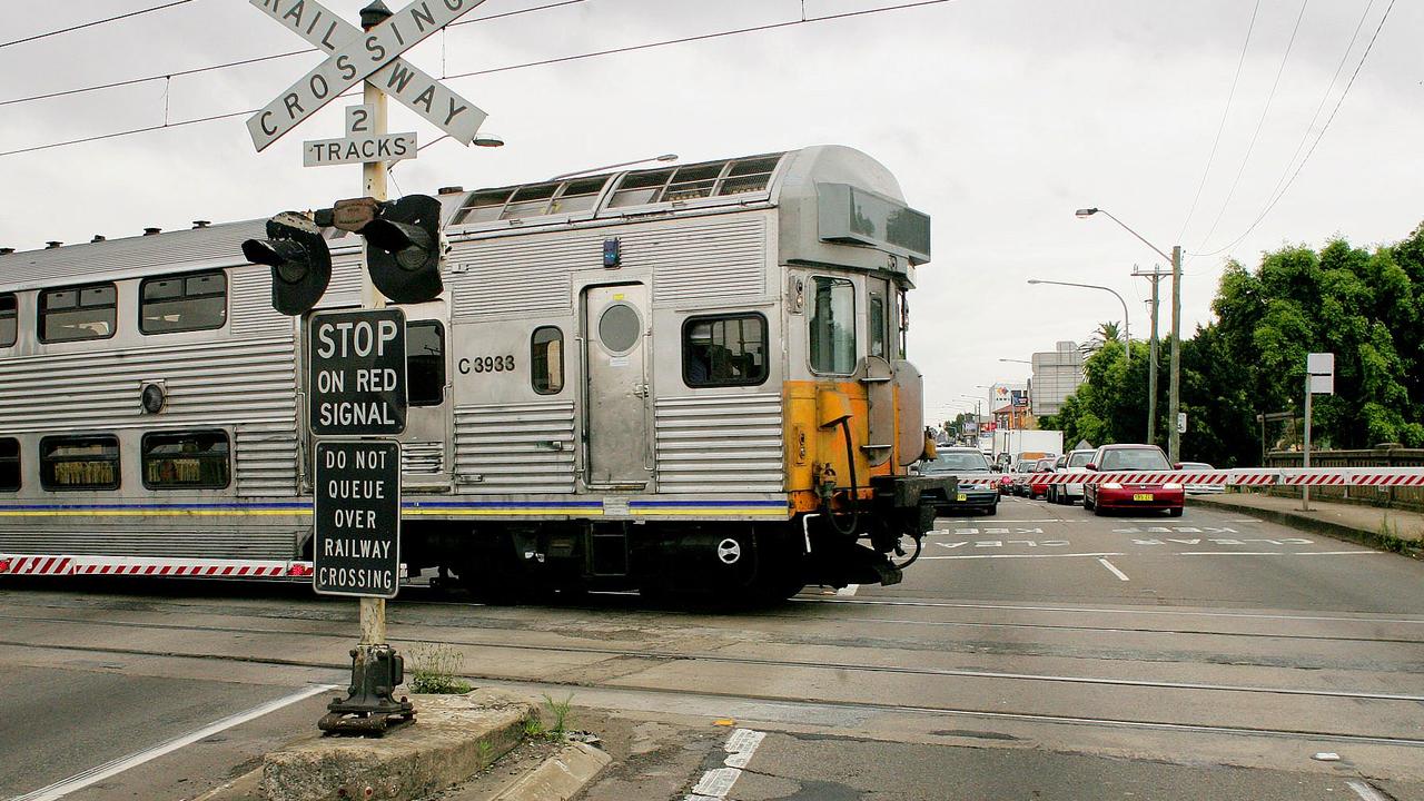 One of Sydney’s few rail crossings, across Parramatta Rd in Granville, will be removed. Picture: Phil Blatch