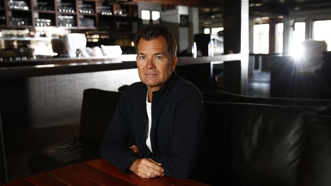 Dave Evans in his empty restaurant, Hugos at the Manly Wharf. Picture: John Appleyard