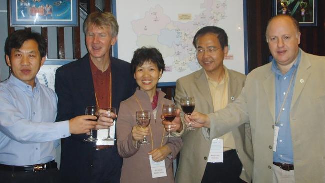 EcoHealth Alliance president Peter Daszak, above right, with the Wuhan Institute of Virology’s Shi Zhengli, centre, and CSIRO’s Linfa Wang, second from right, circa 2005 and taken from a now deleted page on the Wuhan institute’s website.