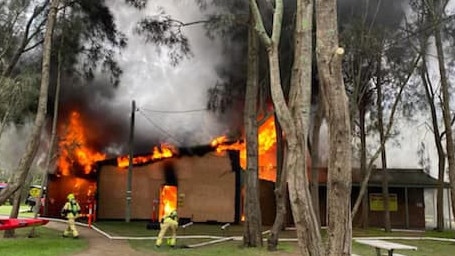 The Narrabeen Lakes Sailing Club and Jamieson Park Paddle, at Jamieson Park, were badly damaged by a fire on Saturday evening. Picture: Rhydian Ward