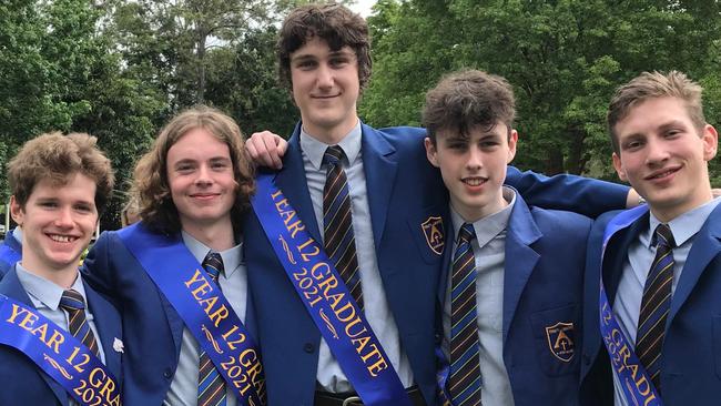 Connor Meldrum (left) celebrates with his Trinity College schoolmates Max Giese, Alex Coleman, Mitchell Mackney and Oscar Steiner.