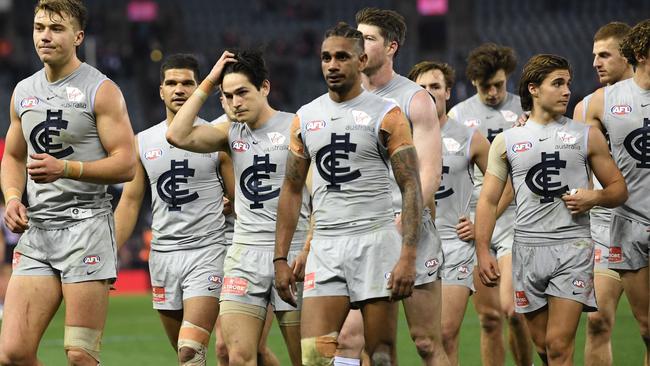 Carlton players leave the ground after another loss. Picture: AAP Images