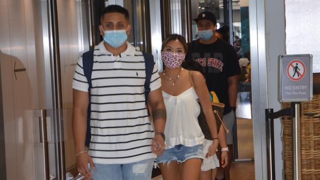 Passengers arriving on a flight from Brisbane on Friday at Cairns Airport all wore masks. Picture: Bronwyn Farr.