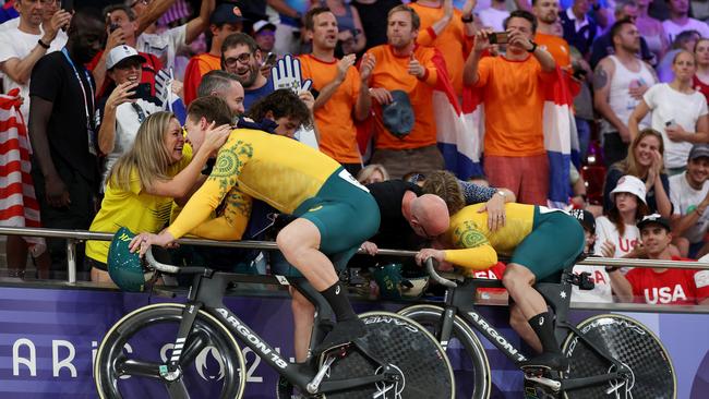 Bronze medalist Matthew Glaetzer and silver medalist Matthew Richardson celebrate with family after the Men's Keirin. Picture: Jared C. Tilton/Getty Images