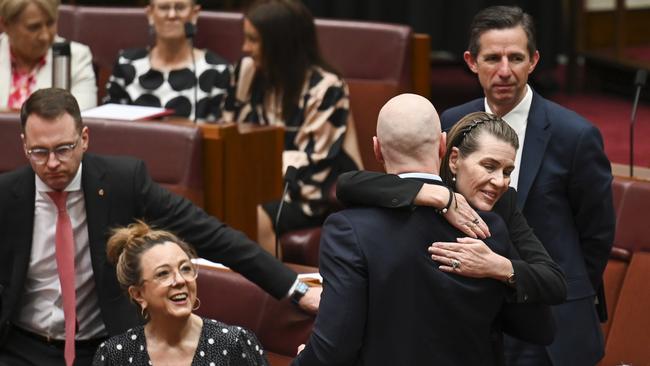 Senator Perin Davey congratulates Senator David Pocock as the Territory Rights Bill passes in the Senate at Parliament House in Canberra. Picture: NCA NewsWire / Martin Ollman