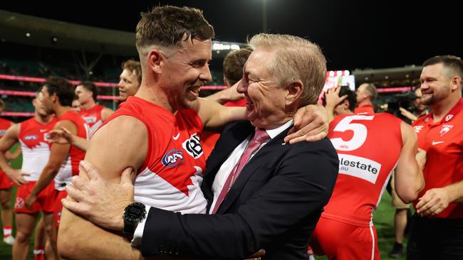 SYDNEY, AUSTRALIA – SEPTEMBER 07: Jake Lloyd of the Swans celebrates with Sydney Swans chairman Andrew Pridham after winning the AFL First Qualifying Final match between Sydney Swans and Greater Western Sydney Giants at Sydney Cricket Ground, on September 07, 2024, in Sydney, Australia. (Photo by Cameron Spencer/Getty Images)