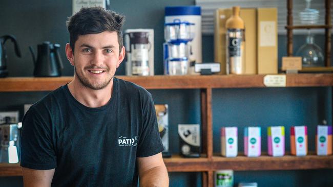 Barista Joe Jones at Patio Coffee Roasters. Picture: AAP/ROY VANDERVEGT