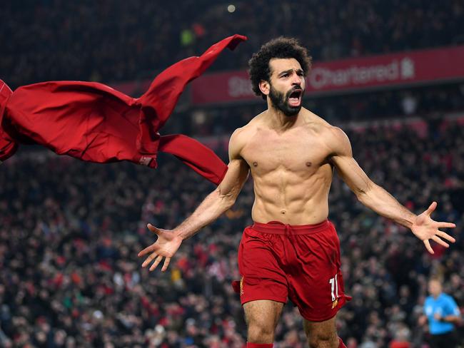 LIVERPOOL, ENGLAND - JANUARY 19: Mohamed Salah of Liverpool celebrates after scoring his team's second goal during the Premier League match between Liverpool FC and Manchester United at Anfield on January 19, 2020 in Liverpool, United Kingdom. (Photo by Michael Regan/Getty Images) *** BESTPIX ***