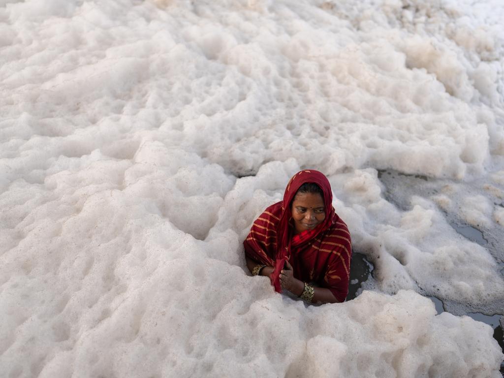 A devotee takes a dip in the waters of Yamuna. Picture: Anindito Mukherjee/Getty Images