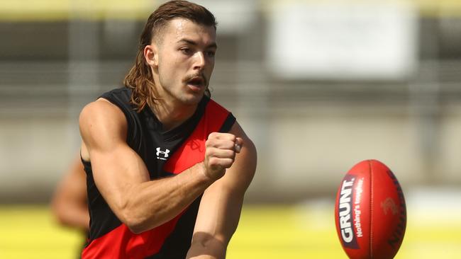 Essedon ruckman Sam Draper gives the hands. Picture: Getty Images