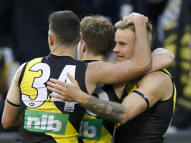 MELBOURNE, AUSTRALIA - AUGUST 25: Brandon Ellis of the Tigers celebrates a goal  during the round 23 AFL match between the Richmond Tigers and the Brisbane Lions at Melbourne Cricket Ground on August 25, 2019 in Melbourne, Australia. (Photo by Darrian Traynor/Getty Images)