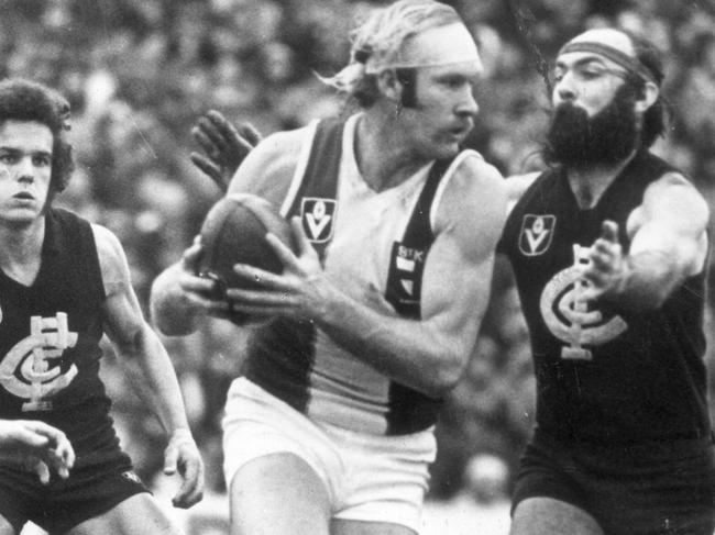 Carl Ditterich (centre) in action for the Saints. Picture: Bruce Doull