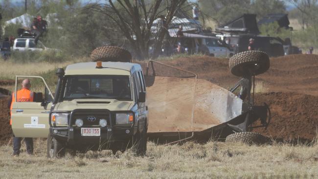 Aaron James and Tanner James after they flipped on the Prologue Day of the 2024 Finke Desert Race. Picture: Gera Kazakov