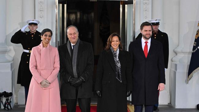 (L-R) Usha Vance, Douglas Emhoff, Kamala Harris and JD Vance stand for a photo as the Vances are welcomed to the White House in Washington, DC. (Photo by ROBERTO SCHMIDT / AFP)