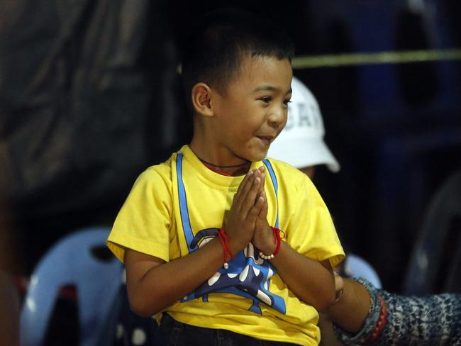 The pure joy was written on this young boy’s face when families were told their loved ones were alive. Picture: AP