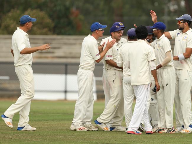 Noble Park celebrate a wicket against Bayswater. Picture: Stuart Milligan