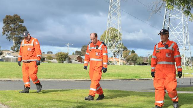 Corio SES volunteers helped sweep the area in a bid to help track the shooter. Picture: Alan Barber