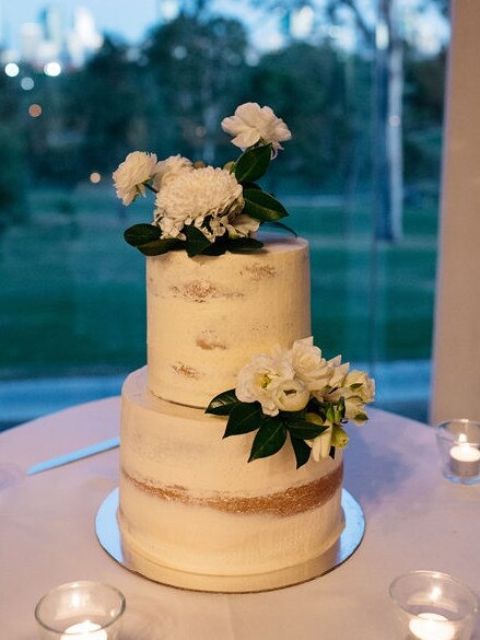 Yummy trim: The wedding cake. Pictures: Moments by Frankie